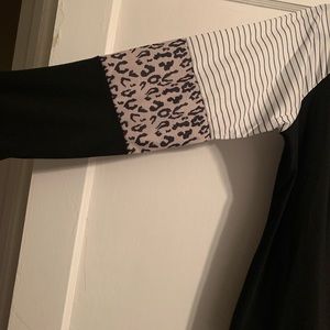 Shirt Black with leopard print. 2xl True to size.